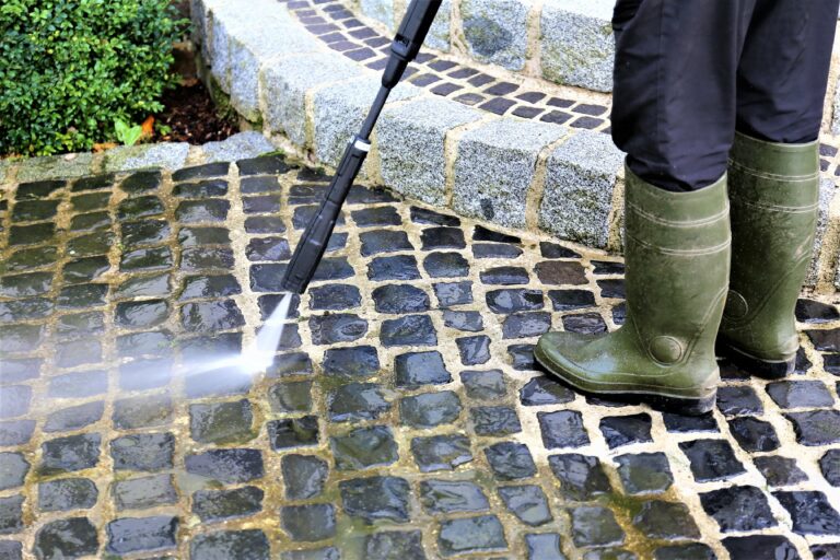 Pressure washing a sidewalk in Boise Idaho